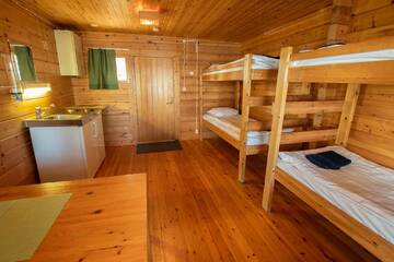 Фото номера Четырехместный номер Кемпинги Ranuanjärvi Camping г. Рануа 10